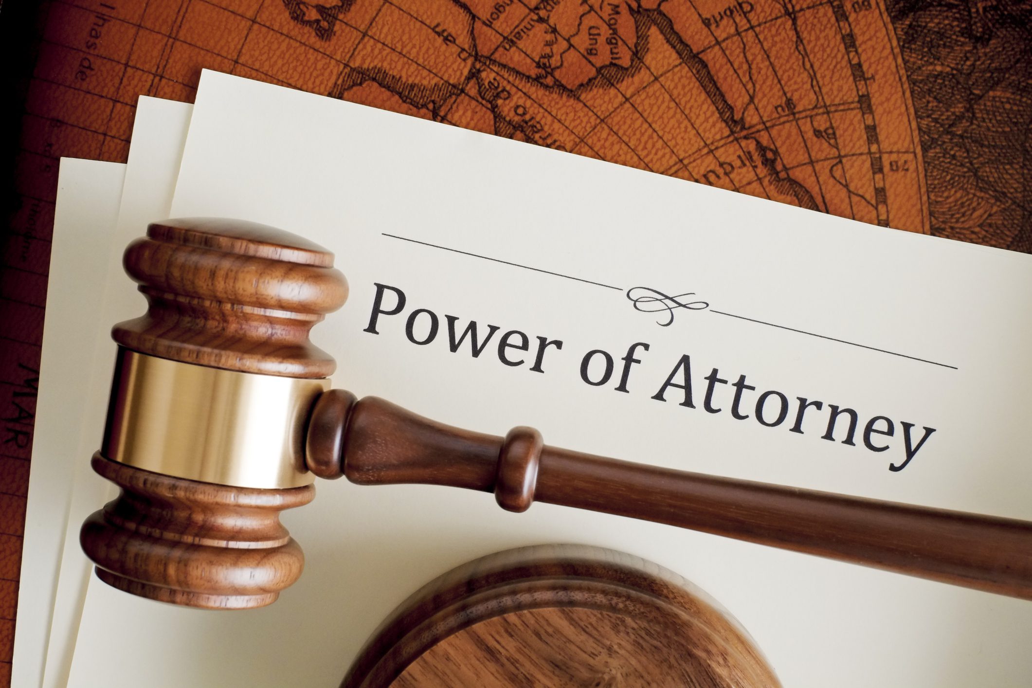 Gavel on Power of Attorney document.